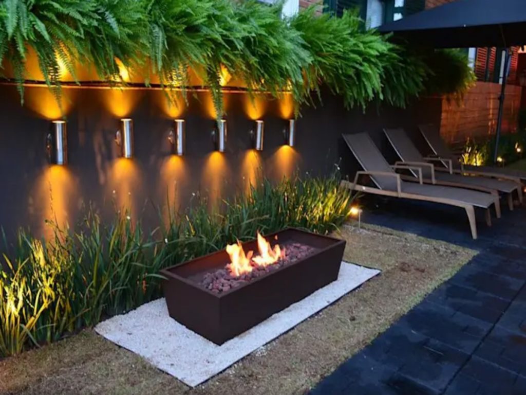 2. Light area with sconces and outdoor fireplace